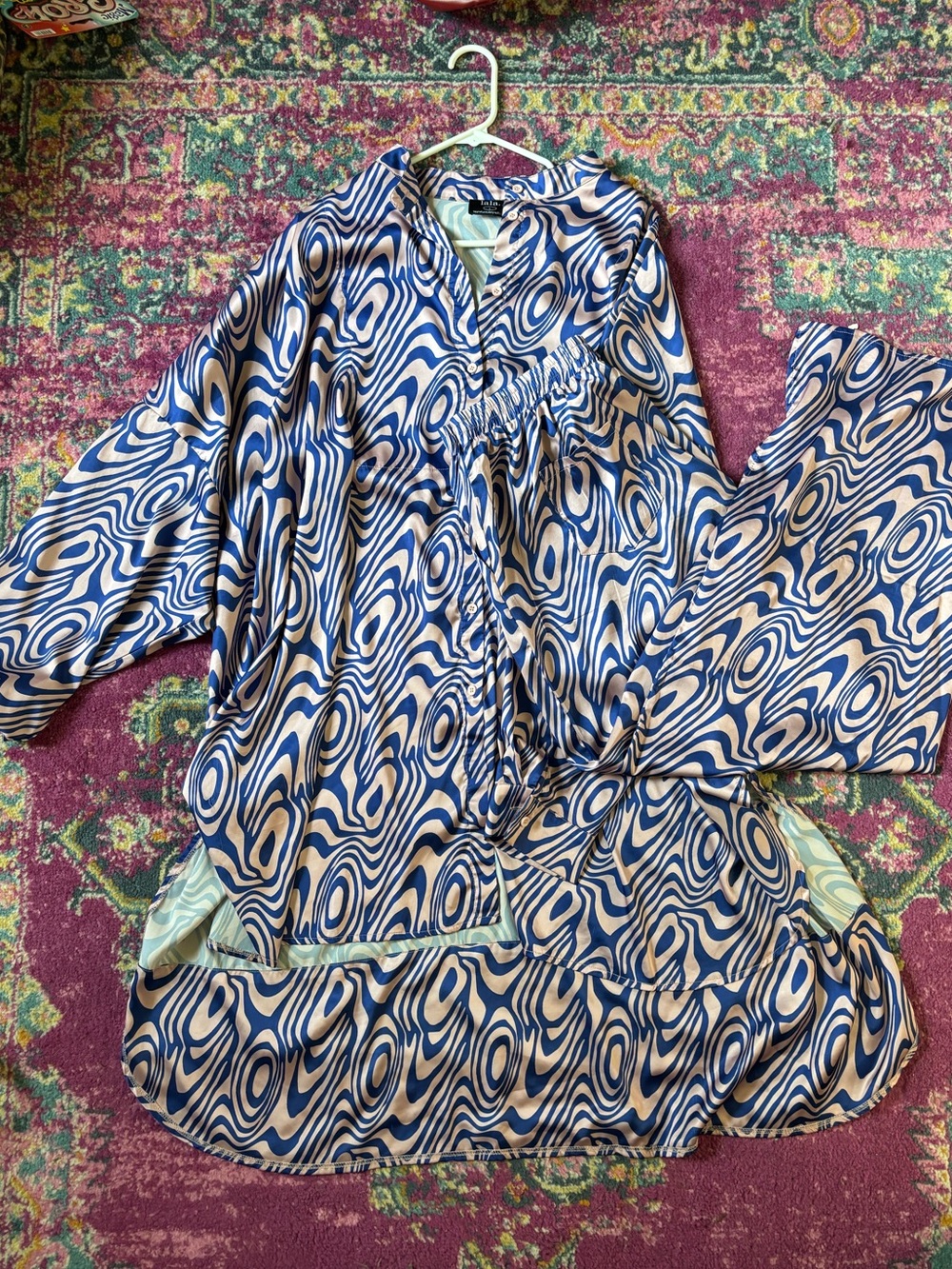 Dressed in LALA Blue and light pink satin matching set.
